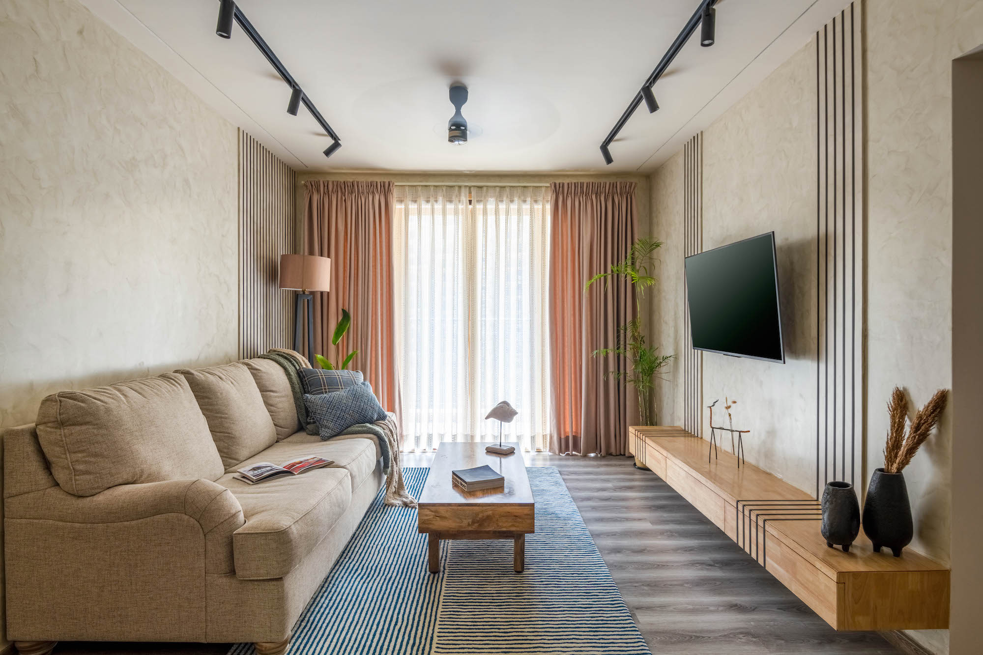 Concepto Studio designs a chic 2.5-BHK apartment in Bangalore for a young couple, maximizing space with clever use of color scheme and wall textures