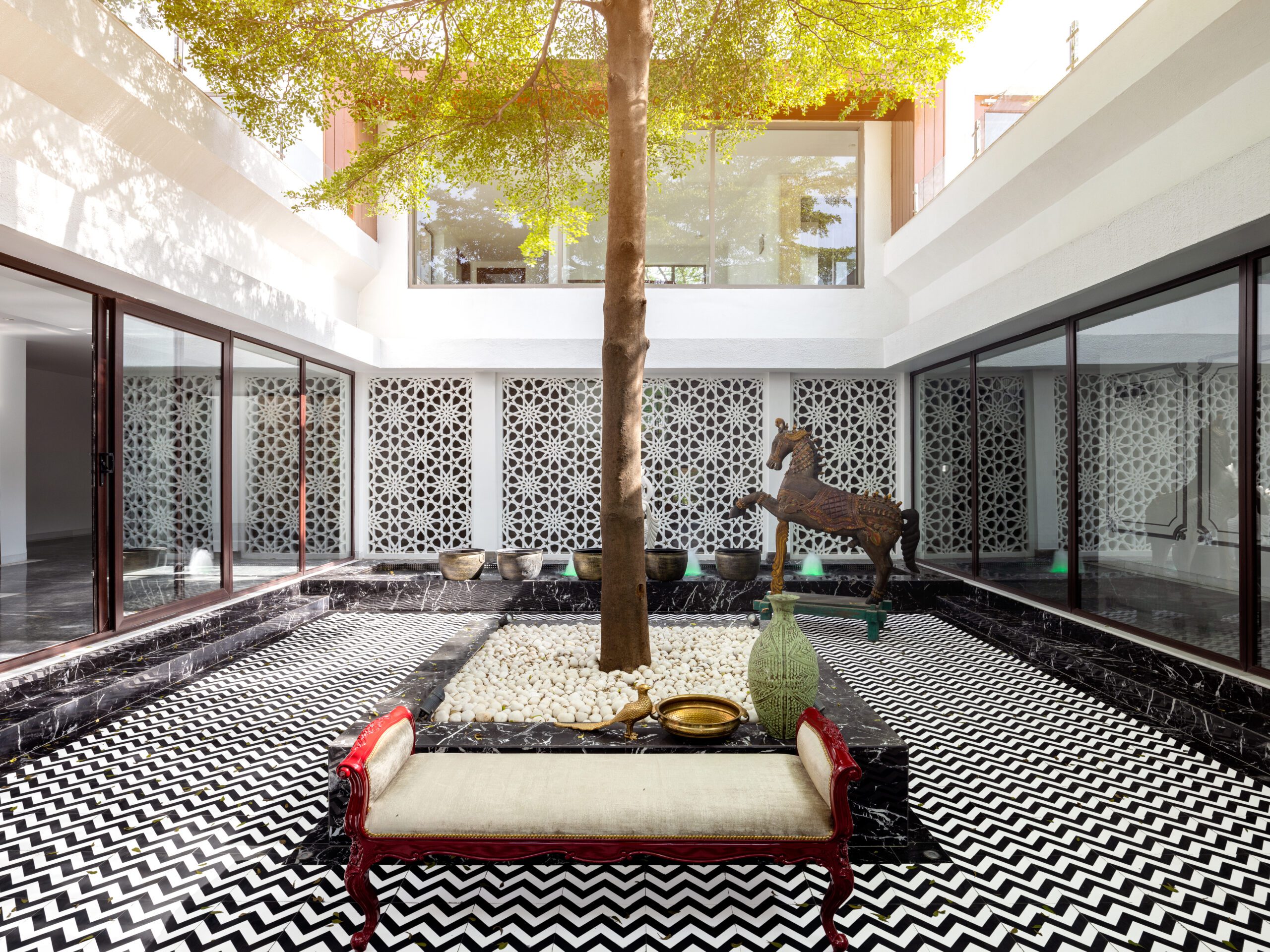 A harmonious confluence of styles and elements articulate grandeur in this luxurious abode by Altus Luxury Living